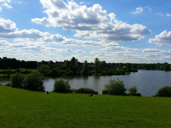 View of lake against cloudy sky