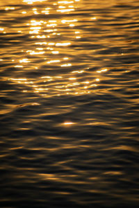 Full frame shot of sea against sky during sunset