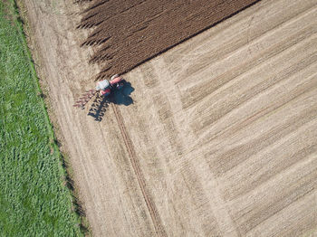 Directly above shot of tractor on farm