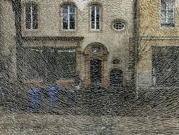 Full frame shot of glass window of old building