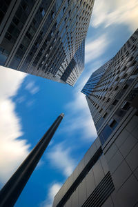 Low angle view of skyscraper against sky