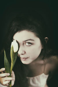 Close-up portrait of a young woman