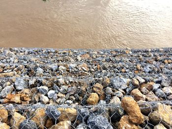 High angle view of stones at beach