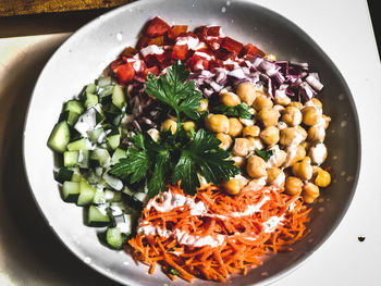 High angle view of mix salad in bowl on table