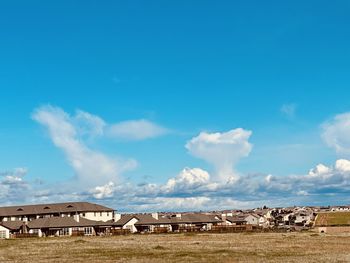 Panoramic view of buildings against sky