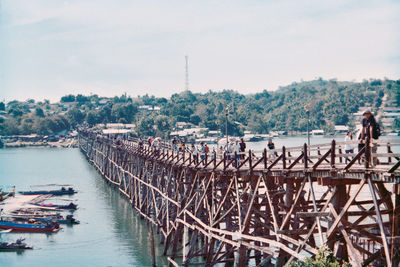 Bridge over river against sky