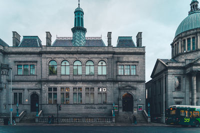Buildings in city against sky