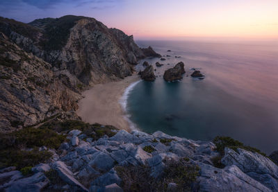 Scenic view of sea against sky during sunset