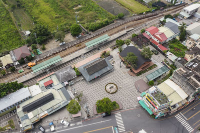 High angle view of street amidst buildings in city