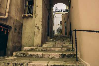 Alley amidst buildings in city