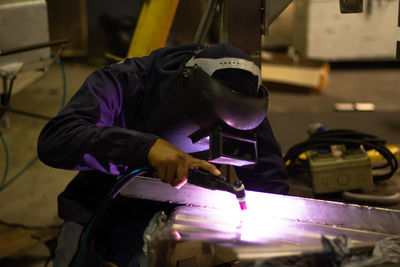 Manual worker working in factory