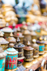 Close-up of candles for sale at market stall