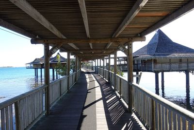 Pier over sea against sky