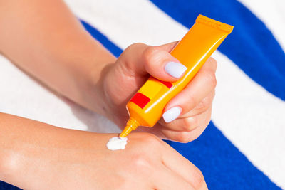 Close-up of woman holding hands