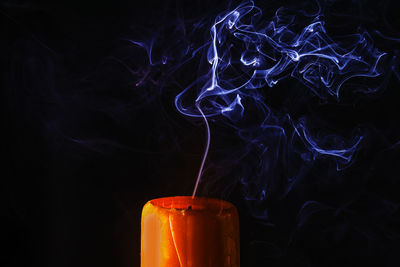 Close-up of fire against black background