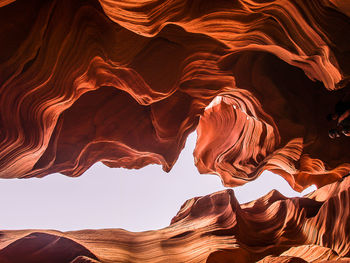 Close up of rock against sky