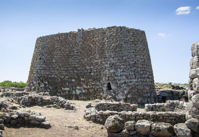 Old ruin building against sky