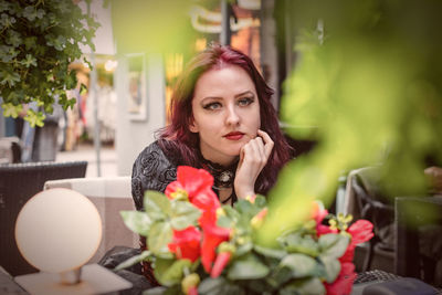 Woman sitting at cafe