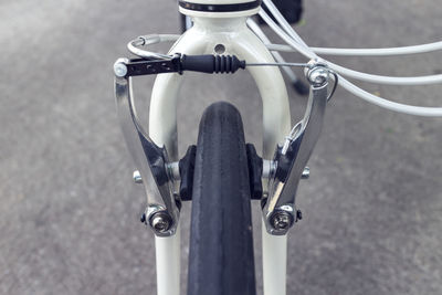 Close-up of bicycle on road