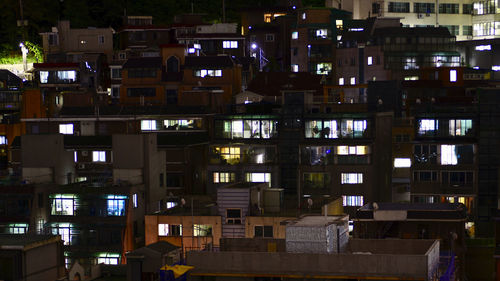 Buildings in city at night