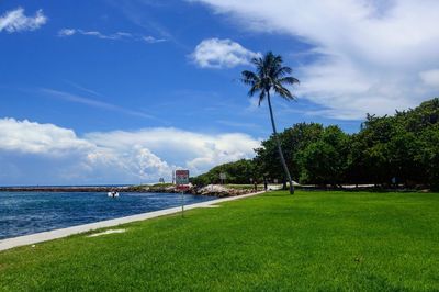 Scenic view of sea against cloudy sky