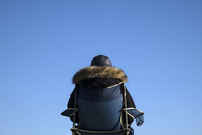 Rear view of a waman in winter