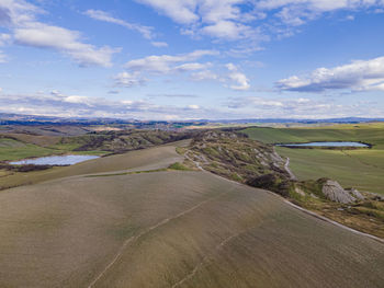 Scenic view of land against sky