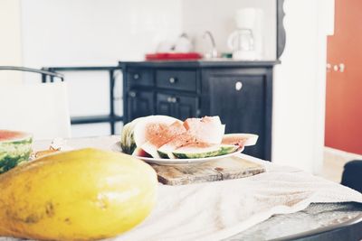 Close-up of fruits in plate at home