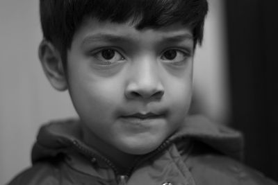 Portrait of confident boy at home