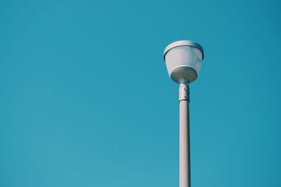 Low angle view of street light against clear sky