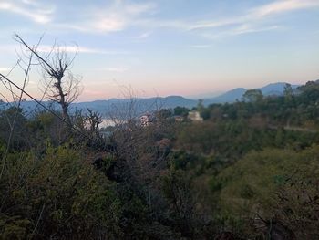 Scenic view of landscape against sky during sunset