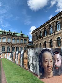 Group of people in front of historical building