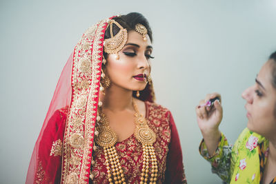 Portrait of young woman looking away