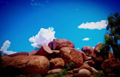 Scenic view of landscape against blue sky