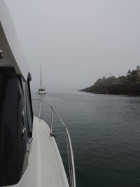 Cropped image of boat in sea