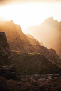 Scenic view of mountains against sky during sunset