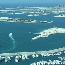 Aerial view of city by sea during winter