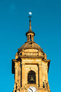 Low angle view of a building against blue sky