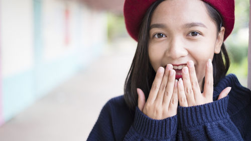 Portrait of smiling young woman