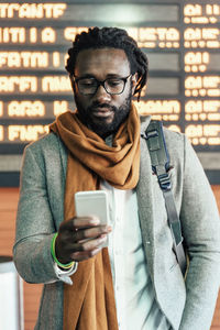 Young man using mobile phone