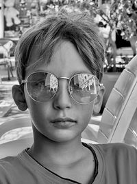 Portrait of young boy wearing sunglasses
