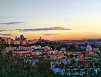 High angle view of city against sky during sunset