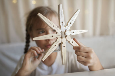 Cute girl playing with toy