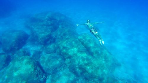 Person swimming in sea