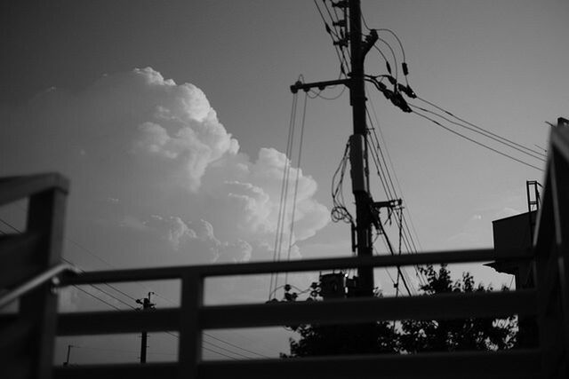 LOW ANGLE VIEW OF SILHOUETTE ELECTRICITY PYLON