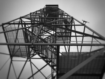 Low angle view of metallic structure against clear sky