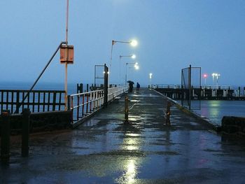 View of bridge over canal in city