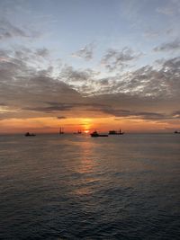 Scenic view of sea against sky during sun rise