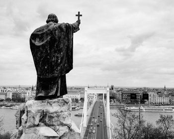 Statue of bridge against sky