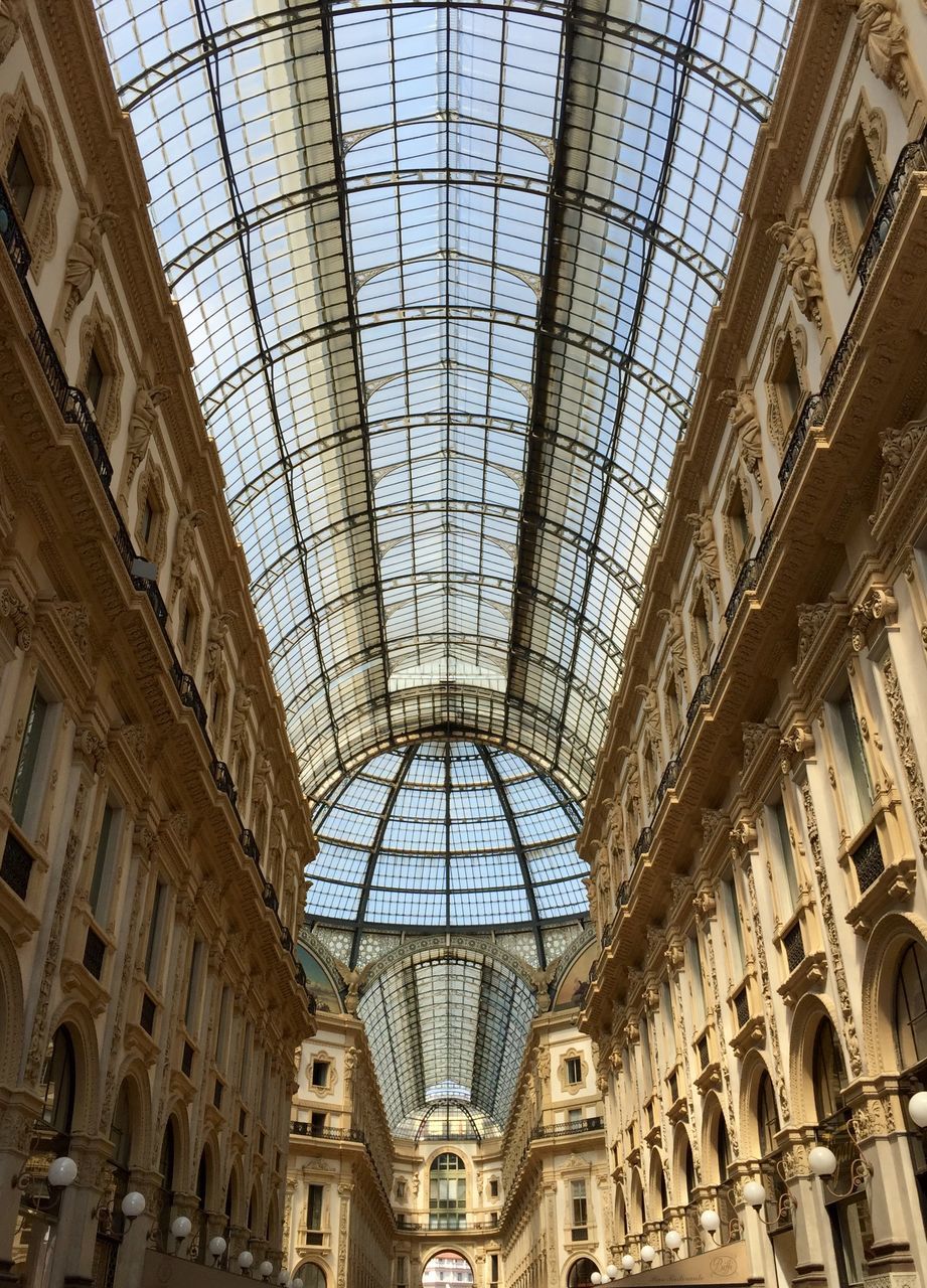 indoors, ceiling, architecture, built structure, low angle view, skylight, interior, architectural feature, pattern, window, design, glass - material, directly below, arch, full frame, famous place, no people, day, shopping mall, backgrounds